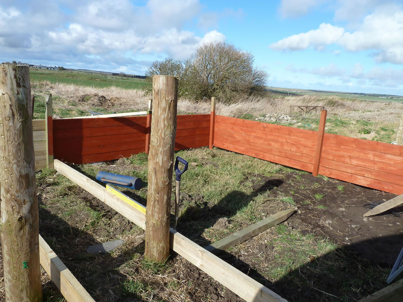 Picture of the start of our outdoor run area and pig house for our pet pigs